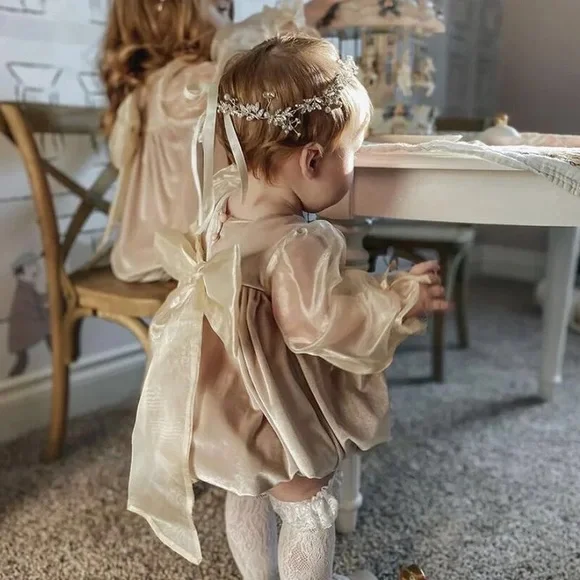It’s not from Petit Maison Kids, romper 12-18 months.